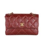 Chanel, a burgundy Wild Stitch Single Flap handbag, featuring the maker's signature wild stitch