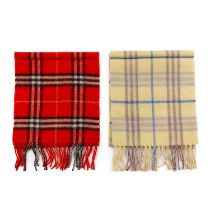Burberry, two Nova Check lambswool scarves, to include a red scarf and a pale yellow scarf, both