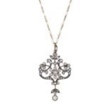 A Belle Epoque silver and gold diamond pendant, with chain