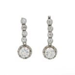 A pair of early 20th century platinum old-cut diamond drop earrings