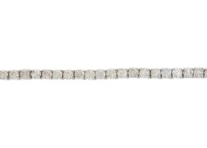 An 18ct brilliant-cut diamond line bracelet