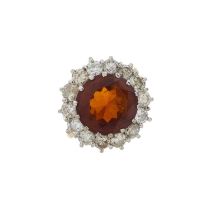 An 18ct gold fire opal and diamond cluster ring