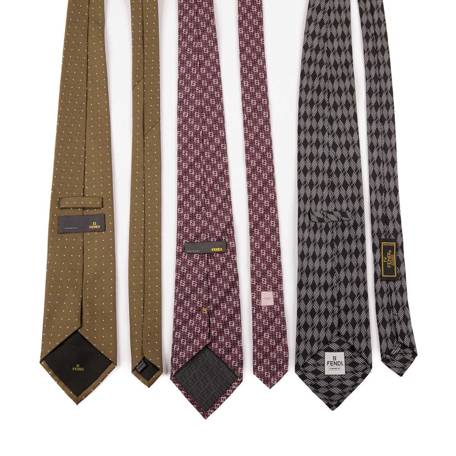 Fendi, three silk ties, to include a tonal purple FF monogram patterned tie, a black and grey - Image 2 of 2