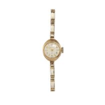 Bulova, a 9ct gold manual wind 23 bracelet watch