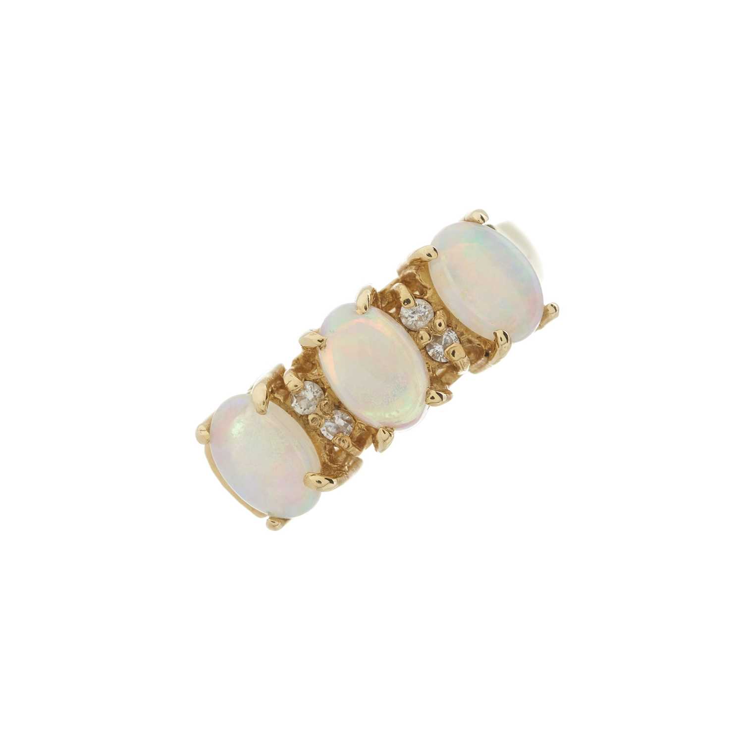 A 14ct gold opal and diamond dress ring