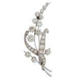 A mid 20th century 18ct gold diamond floral spray brooch