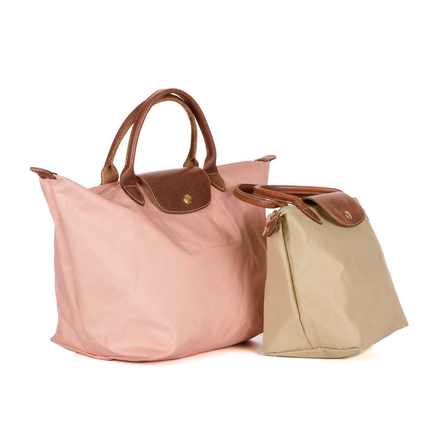 Longchamp, two Le Pliage handbags, to include a medium-sized pink example and a small beige example, - Image 3 of 4