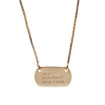 Christian Dior, a New Look 1947 dog tag necklace, the gold-tone dog tag plate impressed with 'Dior