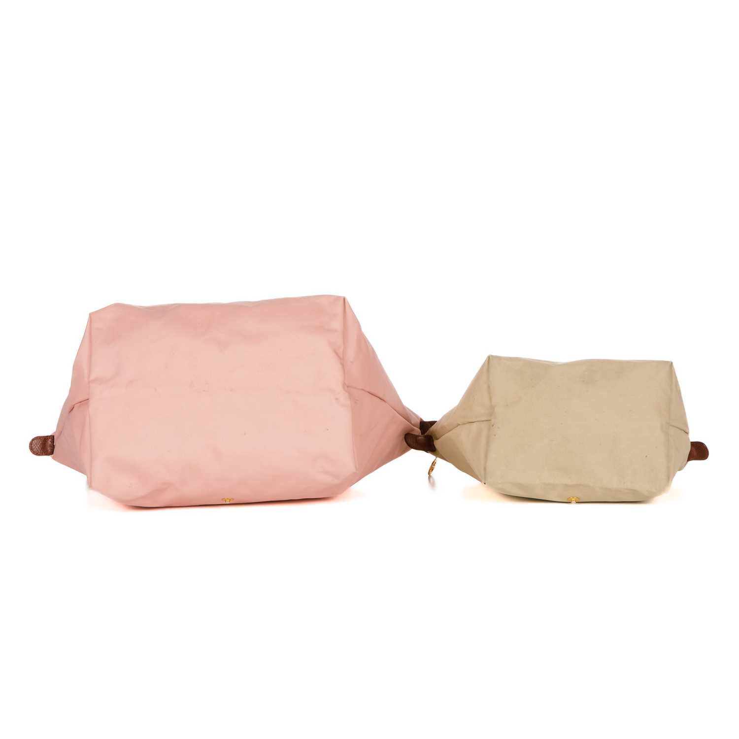 Longchamp, two Le Pliage handbags, to include a medium-sized pink example and a small beige example, - Image 4 of 4