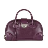 Louis Vuitton, an epi Montaigne GM handbag, crafted from purple epi leather, with silver-tone