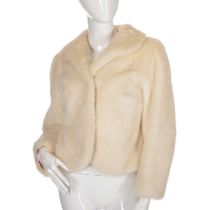A pearl mink jacket, featuring a lapel collar, hook and eye clip fastenings, fuchsia pink lining,