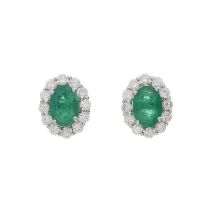 A pair of 18ct gold emerald and diamond cluster stud earrings