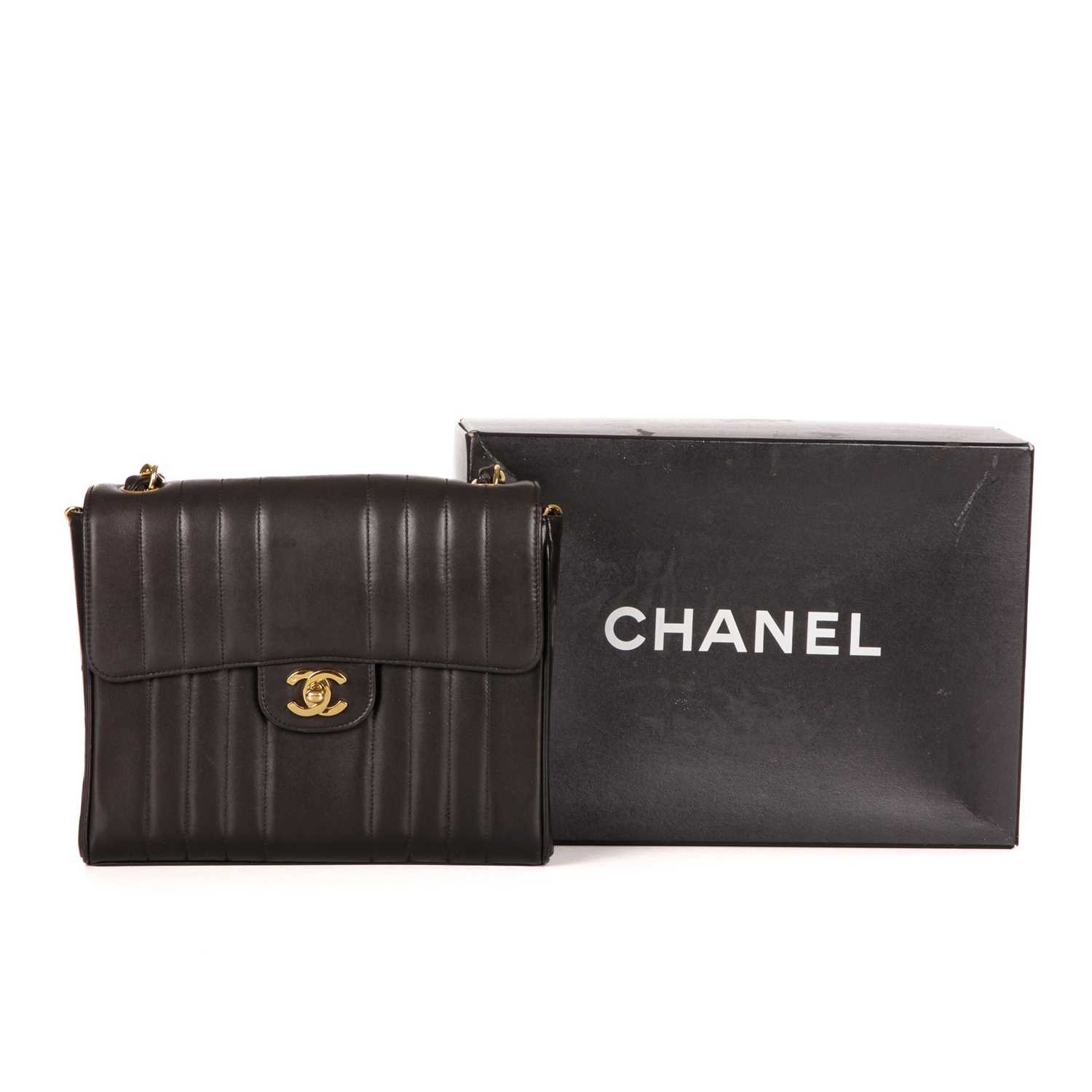Chanel, a vintage vertical Classic Flap handbag, crafted from black lambskin leather, with - Image 5 of 5