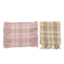 Burberry, two Nova Check lambswool scarves, to include a pale yellow scarf with fringe detailing