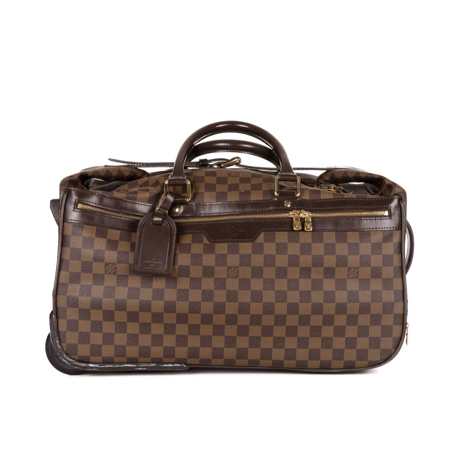 Louis Vuitton, a damier ebene Eole 50 rolling duffle bag, designed with the maker's brown damier