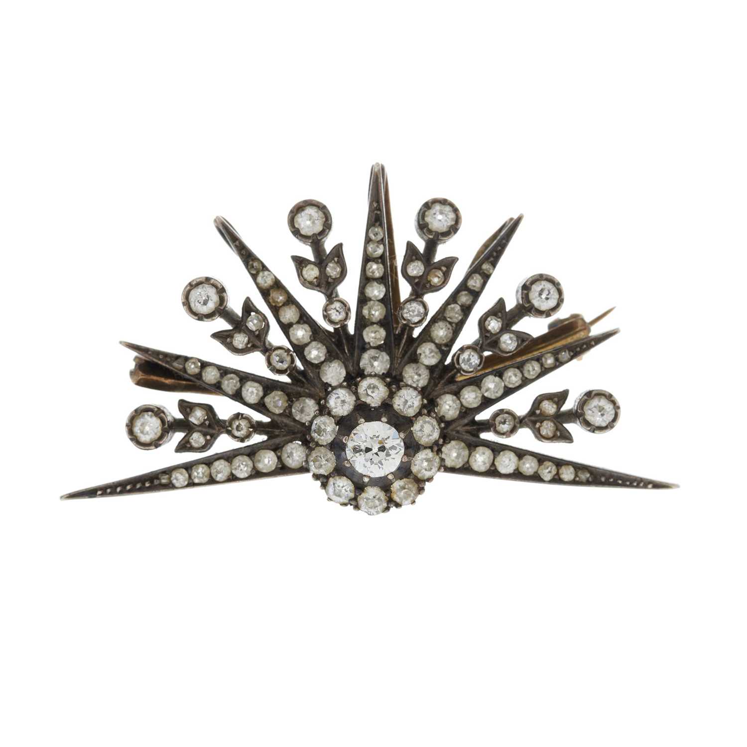 A mid Victorian diamond starburst pendant brooch
