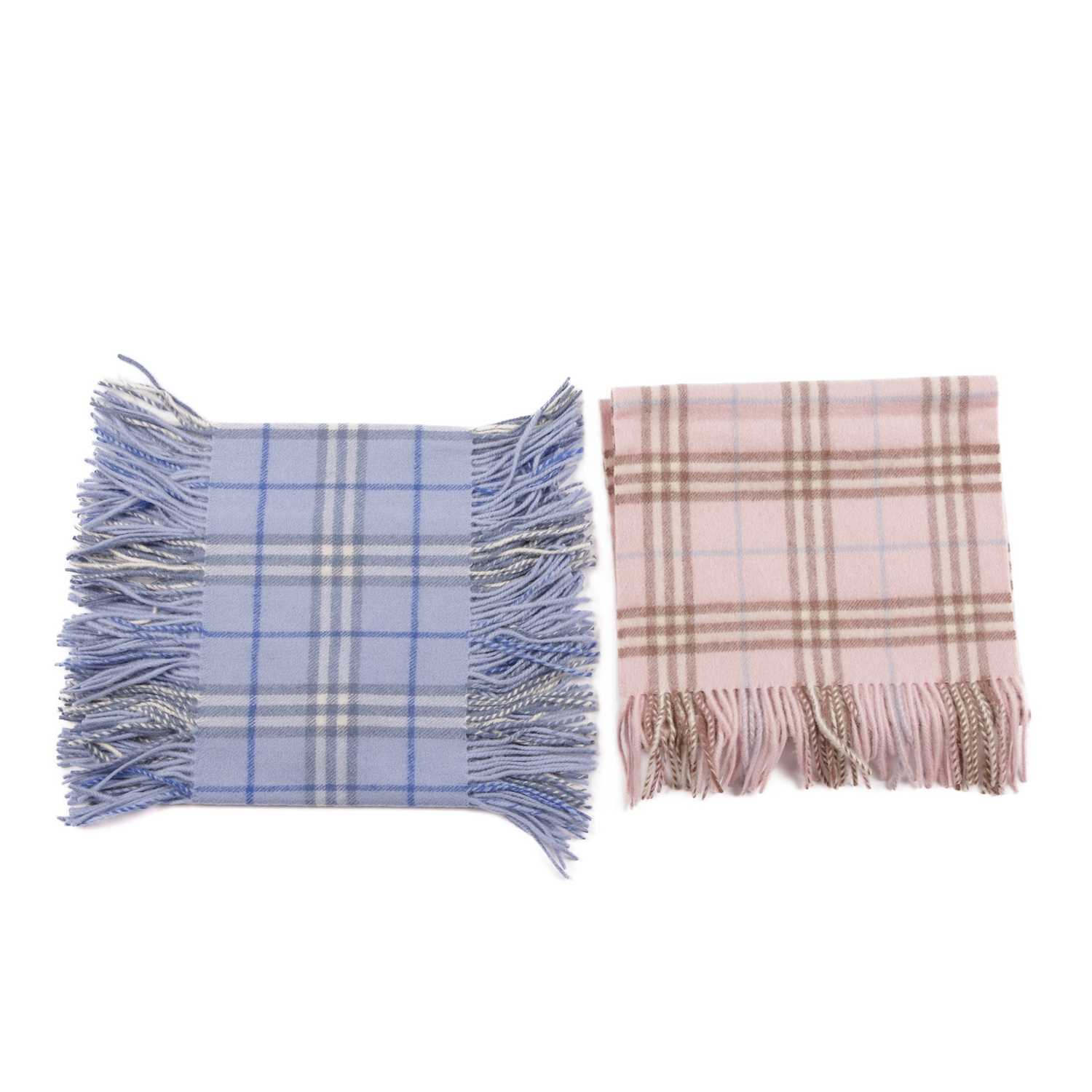 Burberry, two Nova Check lambswool scarves, to include a rose pink scarf with fringe detailing at