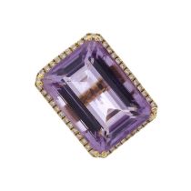 An 18ct gold amethyst and diamond cocktail ring