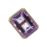 An 18ct gold amethyst and diamond cocktail ring