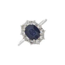 An 18ct gold sapphire and diamond cluster ring