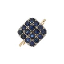 A mid 20th century 18ct gold and platinum sapphire cluster dress ring