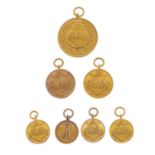 Golfing interest, a selection of gold championship medals, dated between 1897 and 1911