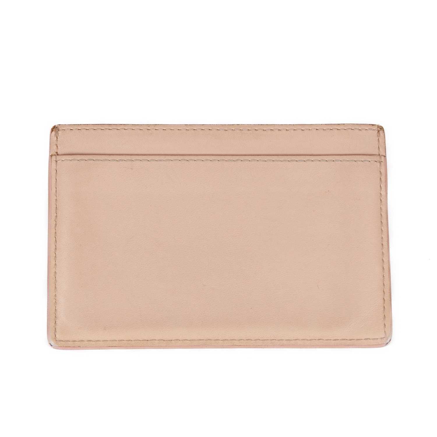 Yves Saint Laurent, a leather card holder, crafted from smooth pale pink leather, with contrasting - Image 2 of 2