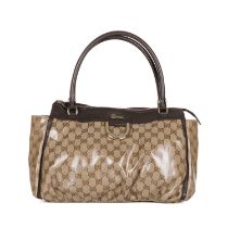 Gucci, a GG Crystal Abbey tote, designed with maker's PVC coated monogram exterior and brown leather