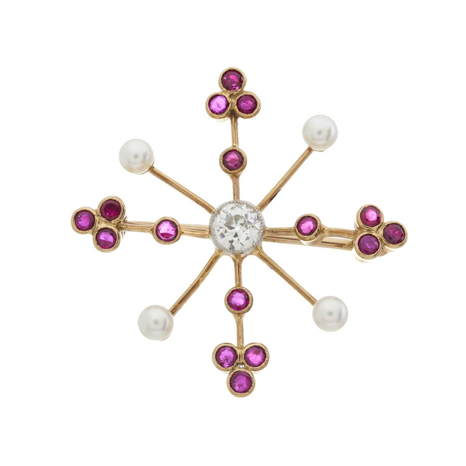 An Edwardian gold diamond, ruby and pearl brooch