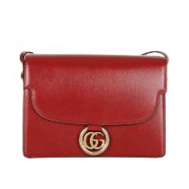 Gucci, a red leather satchel, featuring an adjustable leather shoulder strap, magnetic flap