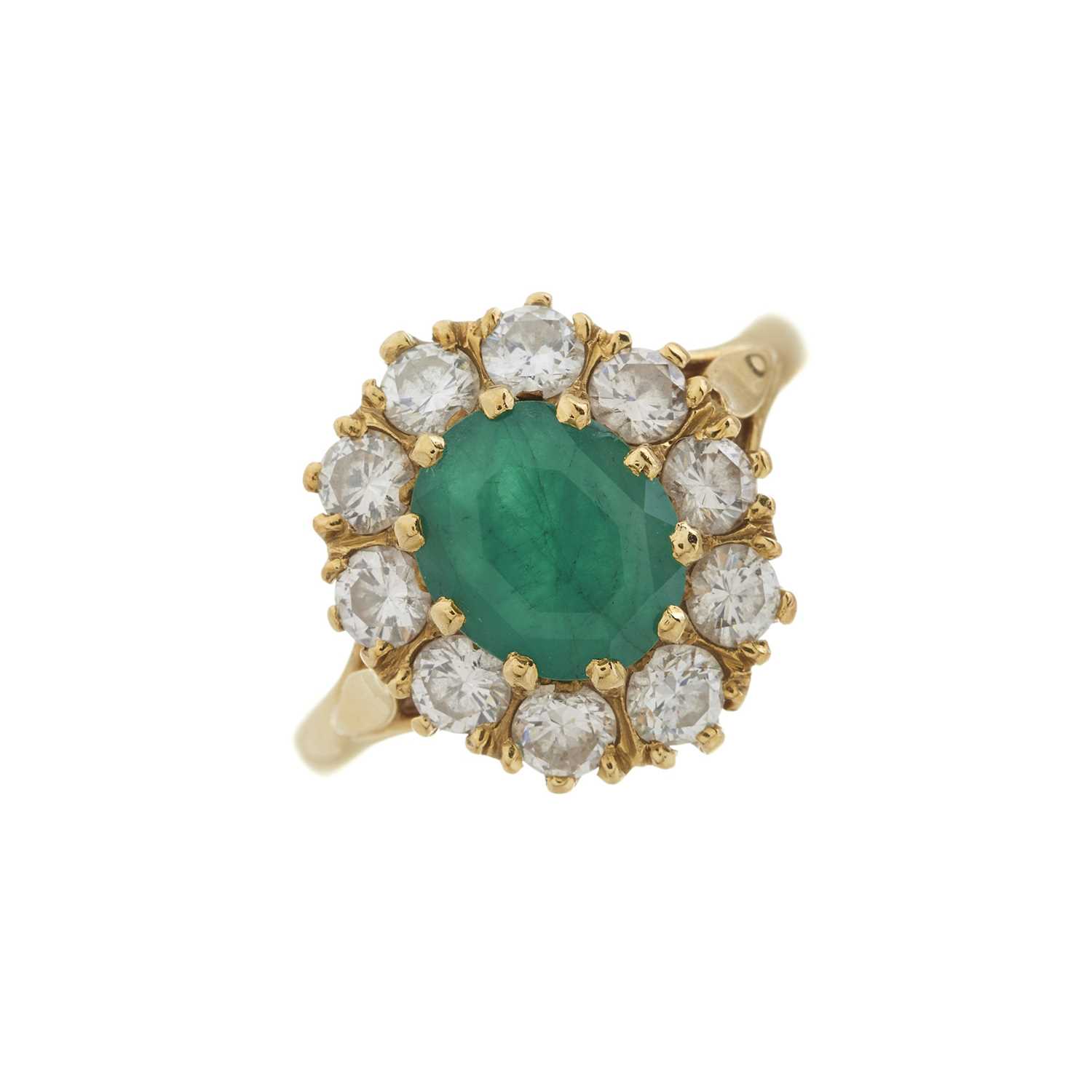 An 18ct gold emerald and diamond cluster ring