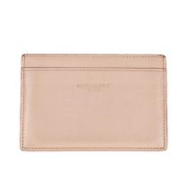 Yves Saint Laurent, a leather card holder, crafted from smooth pale pink leather, with contrasting
