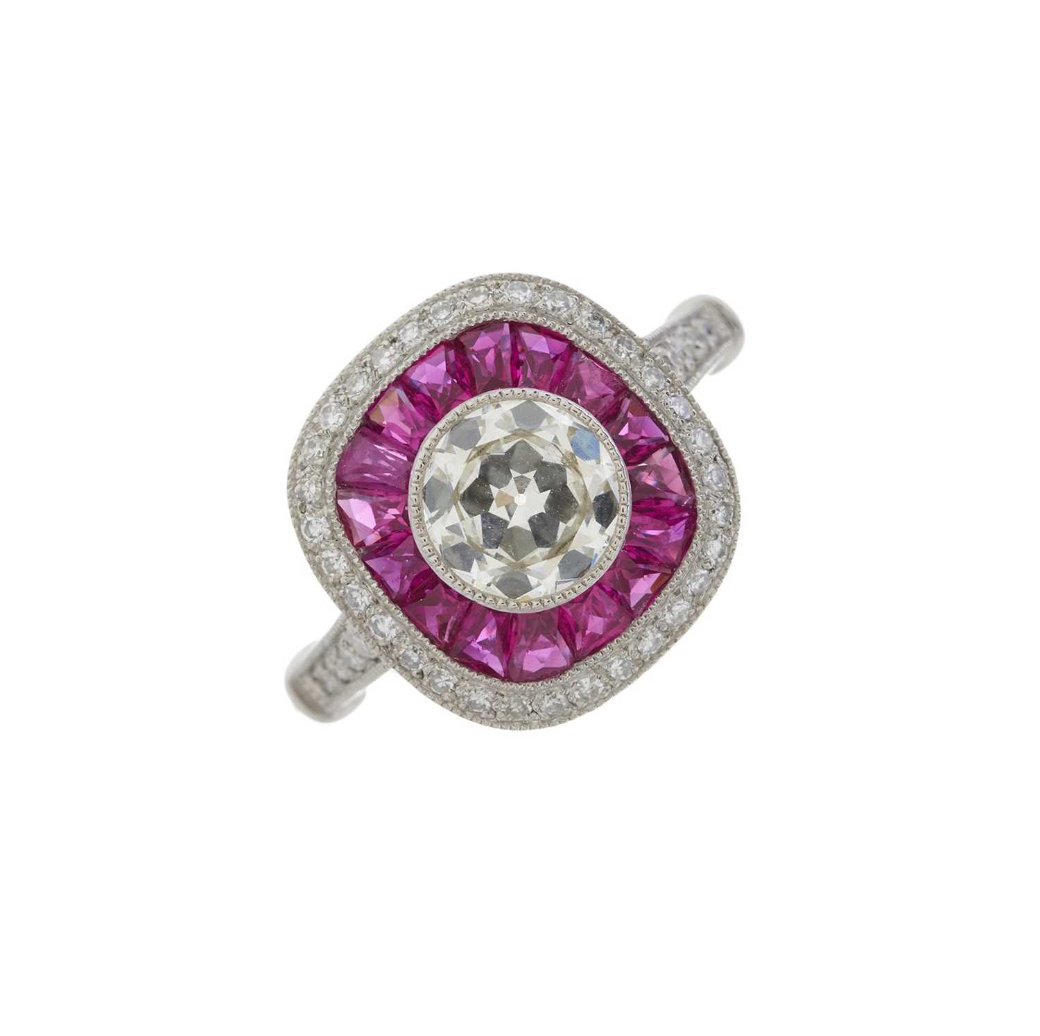 A platinum diamond and ruby cluster dress ring