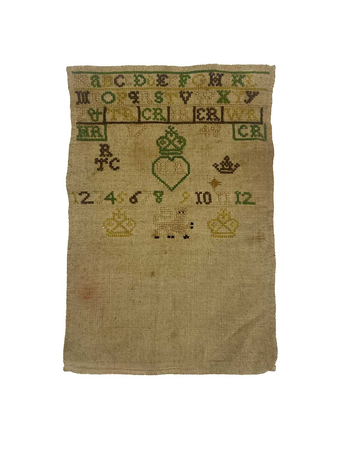 An 18th century George II sampler, dated 1748, embroidered in white, yellow, green and purple with