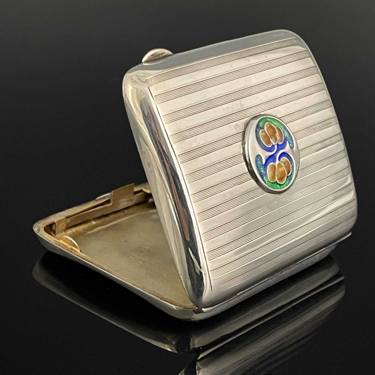 Archibald Knox for Liberty and Co., an Arts and Crafts silver and enamelled cigarette case,