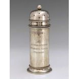 A E Jones, an Arts and Crafts silver shaker, Birmingham 1941, planished tubular turret form with