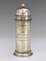 A E Jones, an Arts and Crafts silver shaker, Birmingham 1941, planished tubular turret form with