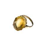 A 9 carat gold citrine single stone ring, approx 2.1cm long, size M, 6.1g