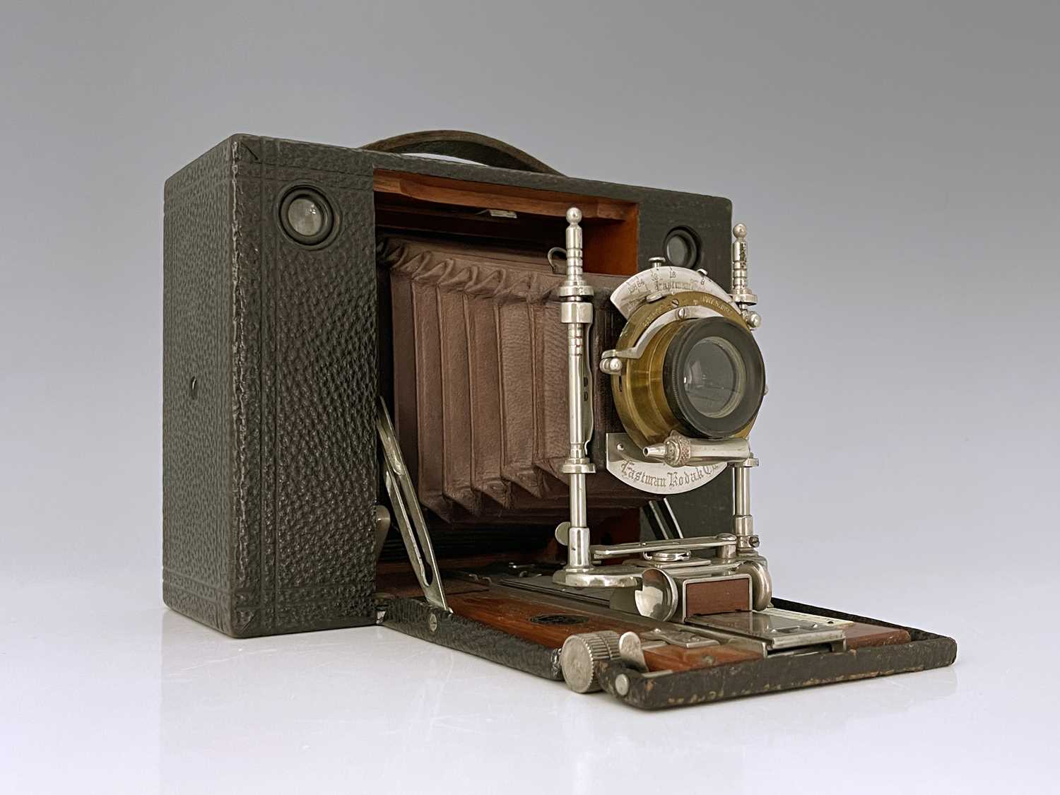 An Eastman Kodak Cartridge concertina camera, brown bellows, with ivorine Sands Hunter plaque,