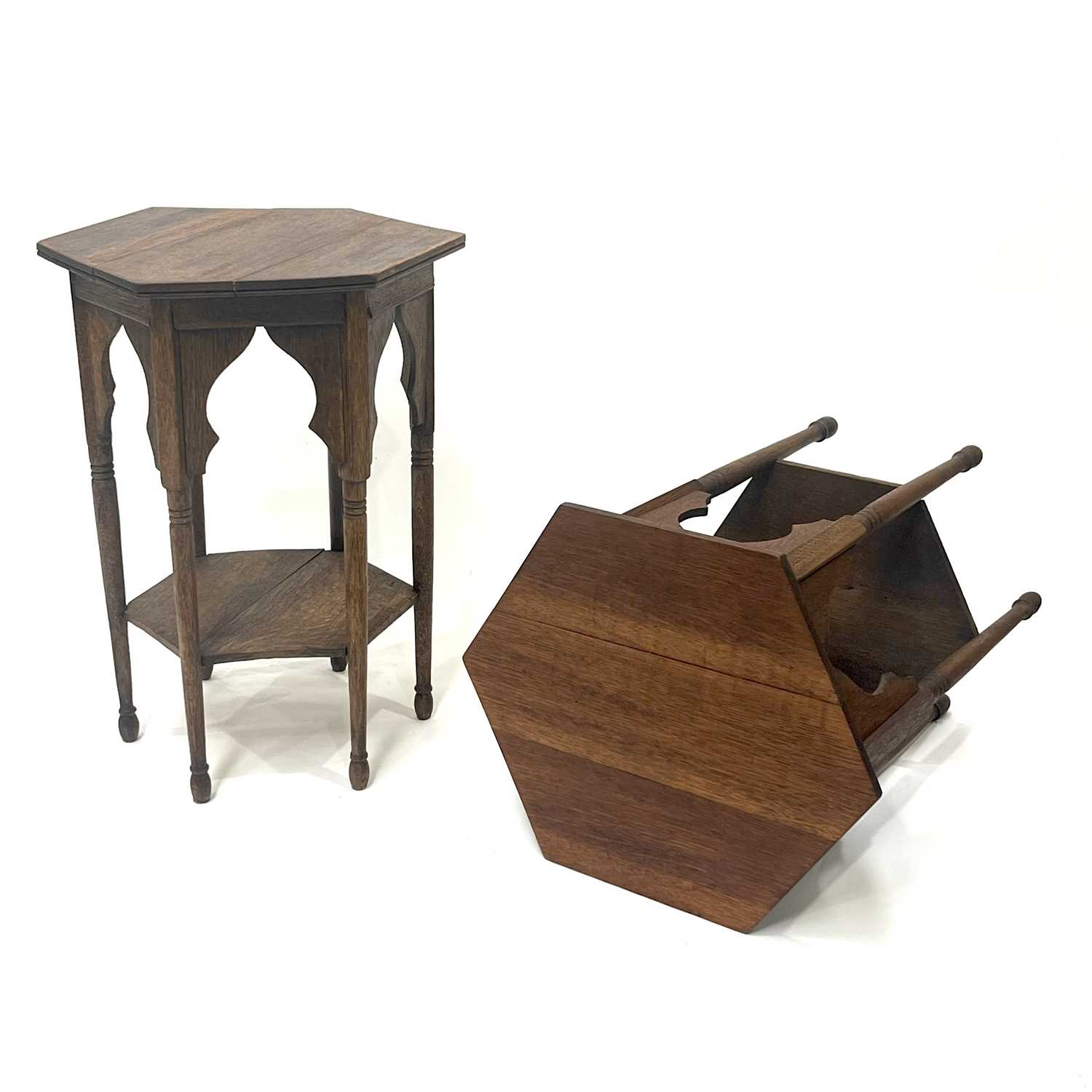 Liberty and Co., a pair of Aesthetic Movement Moorish design oak occasional tables, circa 1890s,