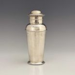 An Art Deco silver cocktail shaker, Adie Brothers, Birmingham 1929, shouldered milk churn form