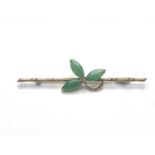 A Chinese 14ct gold jade brooch, bamboo bar with jade cabochon leaves, 6cm long