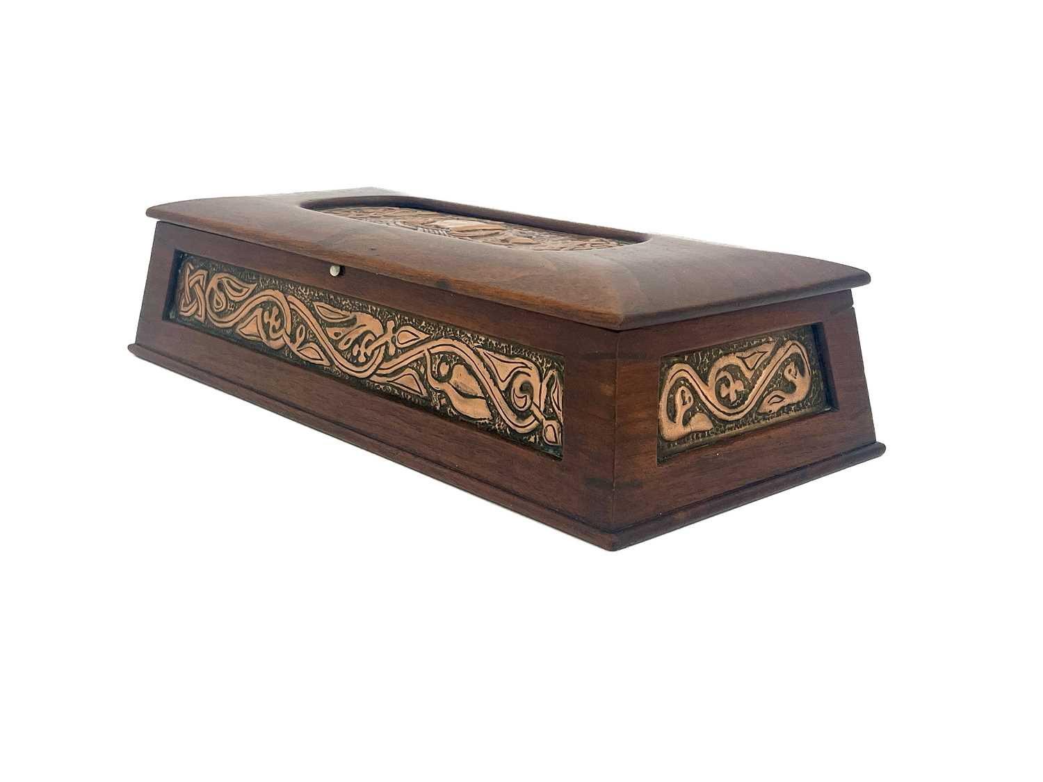 Alexander Ritchie, an Iona Arts and Crafts copper and walnut box, sarcophagus form set with repousse