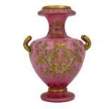 A Continental pink cased enamelled and gilt glass twin handled vase, probably Ludwig Moser, circa