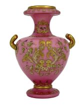 A Continental pink cased enamelled and gilt glass twin handled vase, probably Ludwig Moser, circa