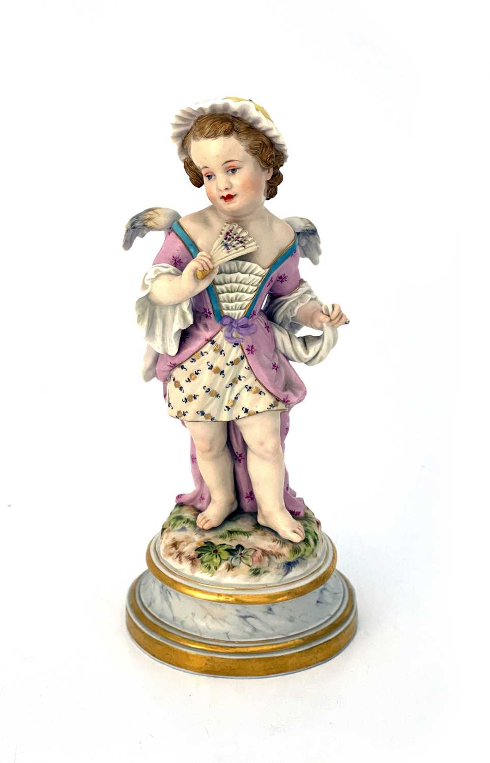 Heinrich Schwabe for Meissen, a figure of a winged putto, model L111, Cupid as a Coquette, late 19th