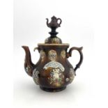 A large Measham Bargeware teapot, circa 1880, baluster form, decorated with flower and foliate
