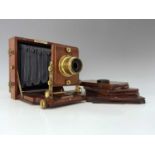 A J. Lancaster 1891 Instantograph Patent concertina Field camera, mahogany with brass fittings, blue