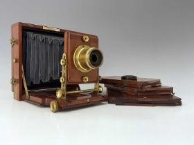 A J. Lancaster 1891 Instantograph Patent concertina Field camera, mahogany with brass fittings, blue