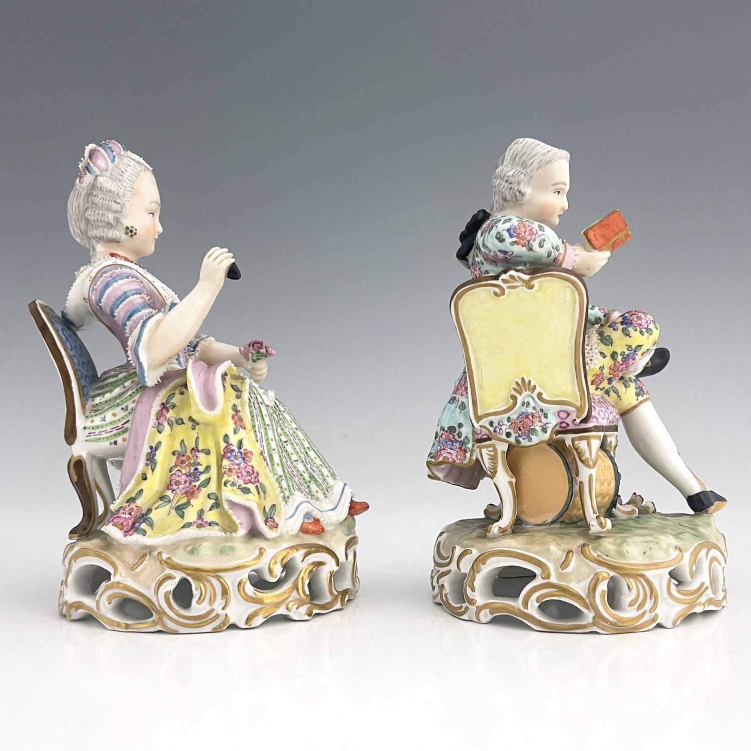 A pair of Meissen type figures, probably late 18th century, model 137, modelled as a seated woman - Image 5 of 6